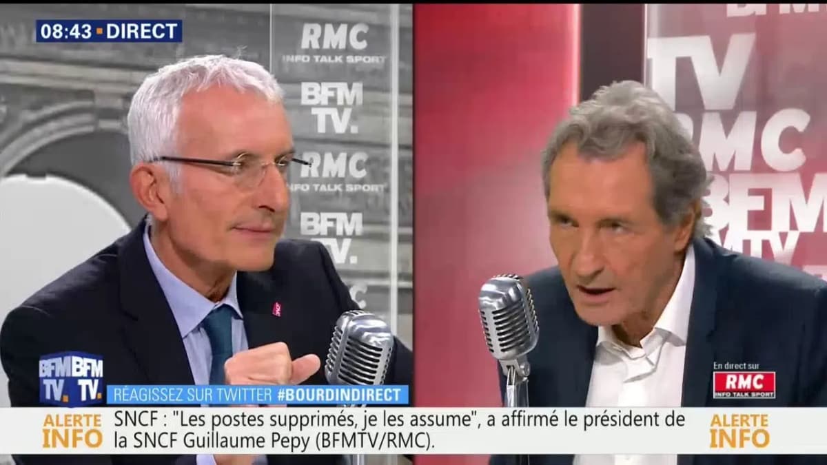 BFMTV–RMC en direct : deux hommes au micro, bandeau « SNCF :